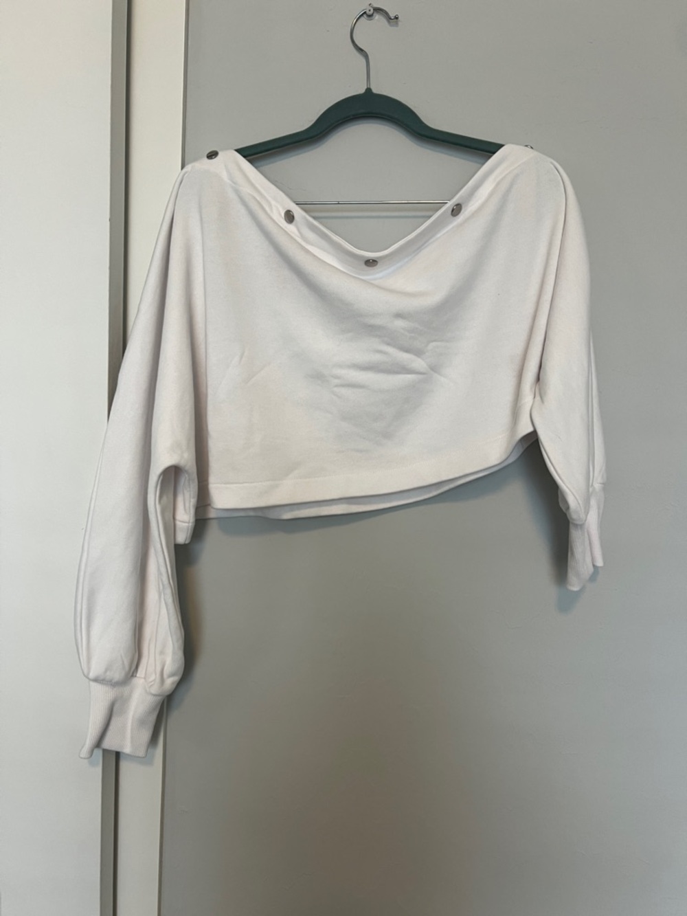 Jennifer Lopez white off the shoulder Cropped Boatneck Sweatshirt